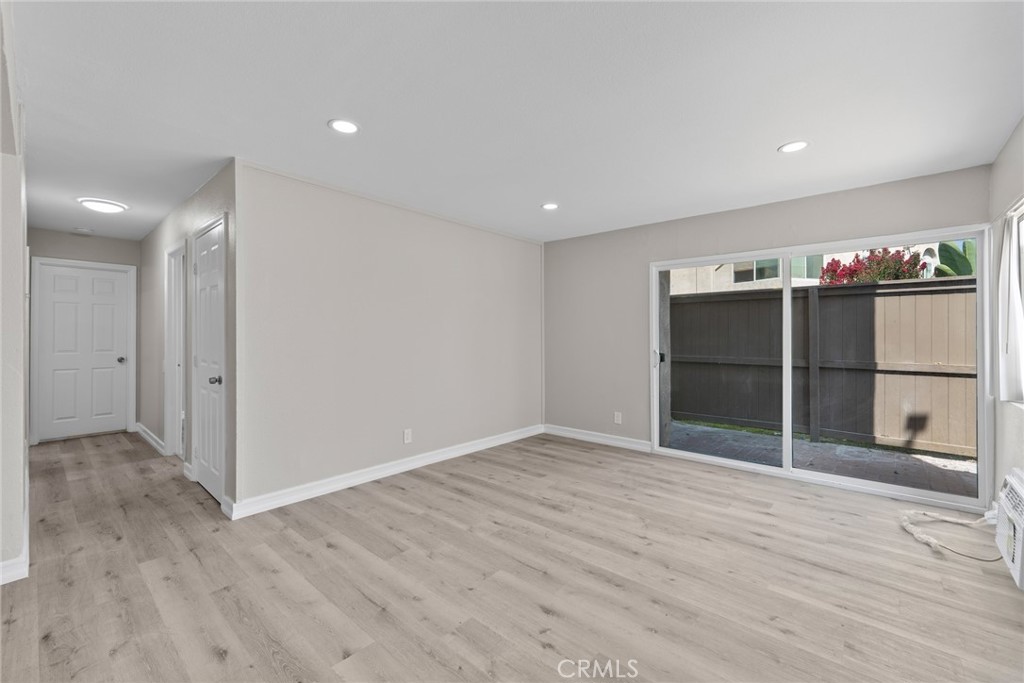 212 South Kraemer Boulevard, Unit 709 Placentia, CA 92870 - Photo 13 of 32 a view of an empty room with wooden floor