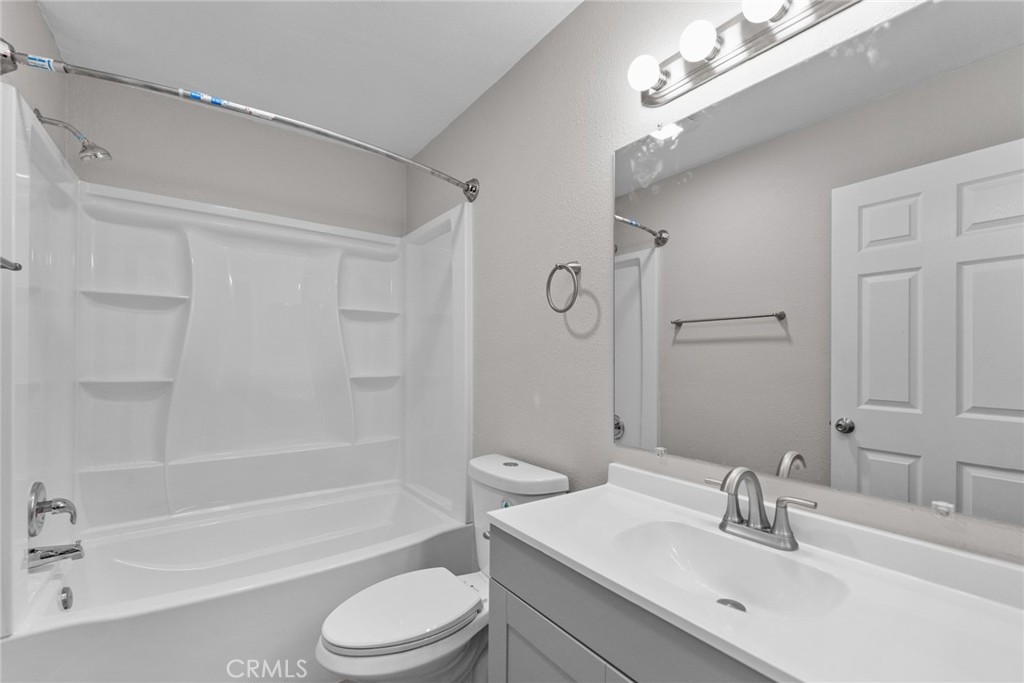 212 South Kraemer Boulevard, Unit 709 Placentia, CA 92870 - Photo 19 of 32 a bathroom with a sink a toilet and a bathtub