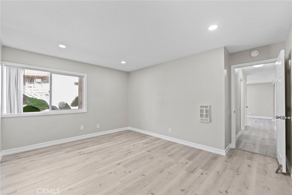 212 South Kraemer Boulevard, Unit 709 Placentia, CA 92870 - Photo 21 of 32 wooden floor in an empty room with a window