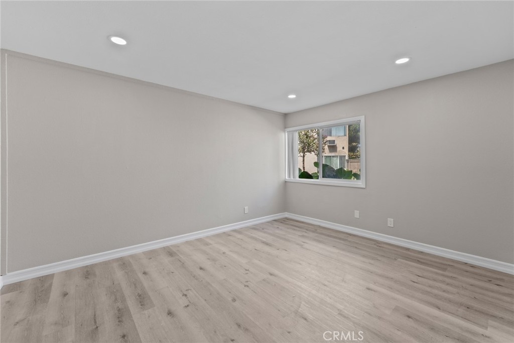 212 South Kraemer Boulevard, Unit 709 Placentia, CA 92870 - Photo 22 of 32 a view of empty room with wooden floor and fan