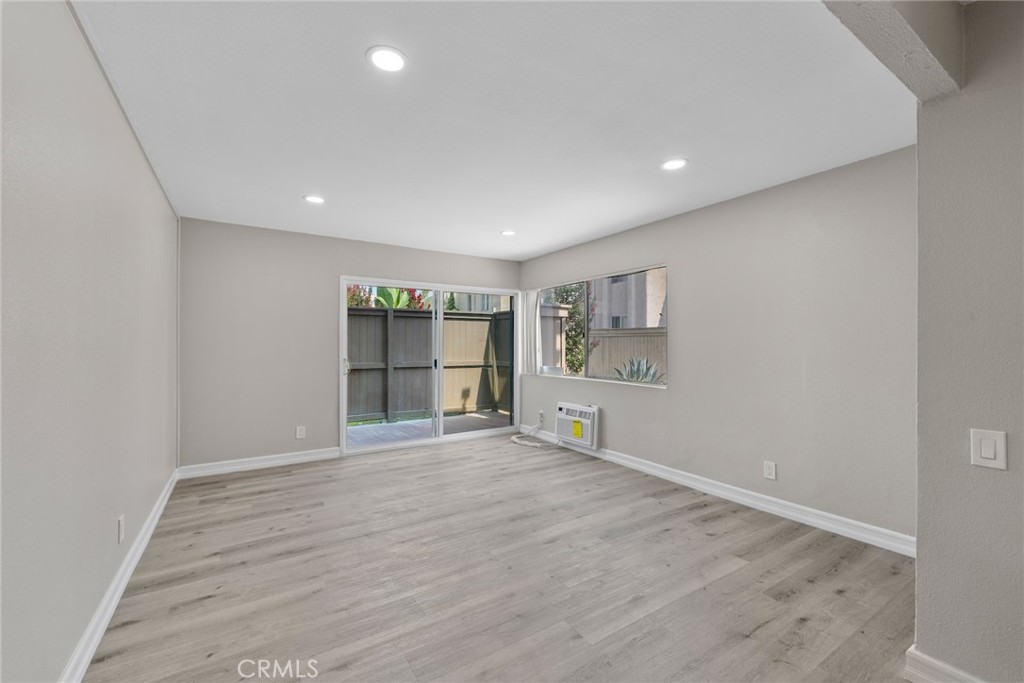 212 South Kraemer Boulevard, Unit 709 Placentia, CA 92870 - Photo 27 of 32 a view of an empty room with wooden floor and closet