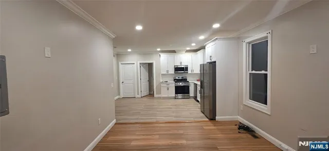 a view of a kitchen with a sink
