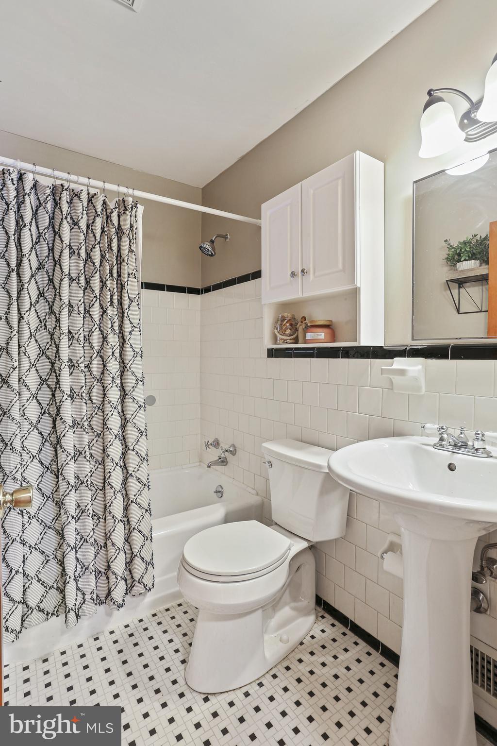 5509 Heatherwood Road Halethorpe, MD 21227 - Photo 16 of 34 Full Bath Main Level w/Tile Flooring