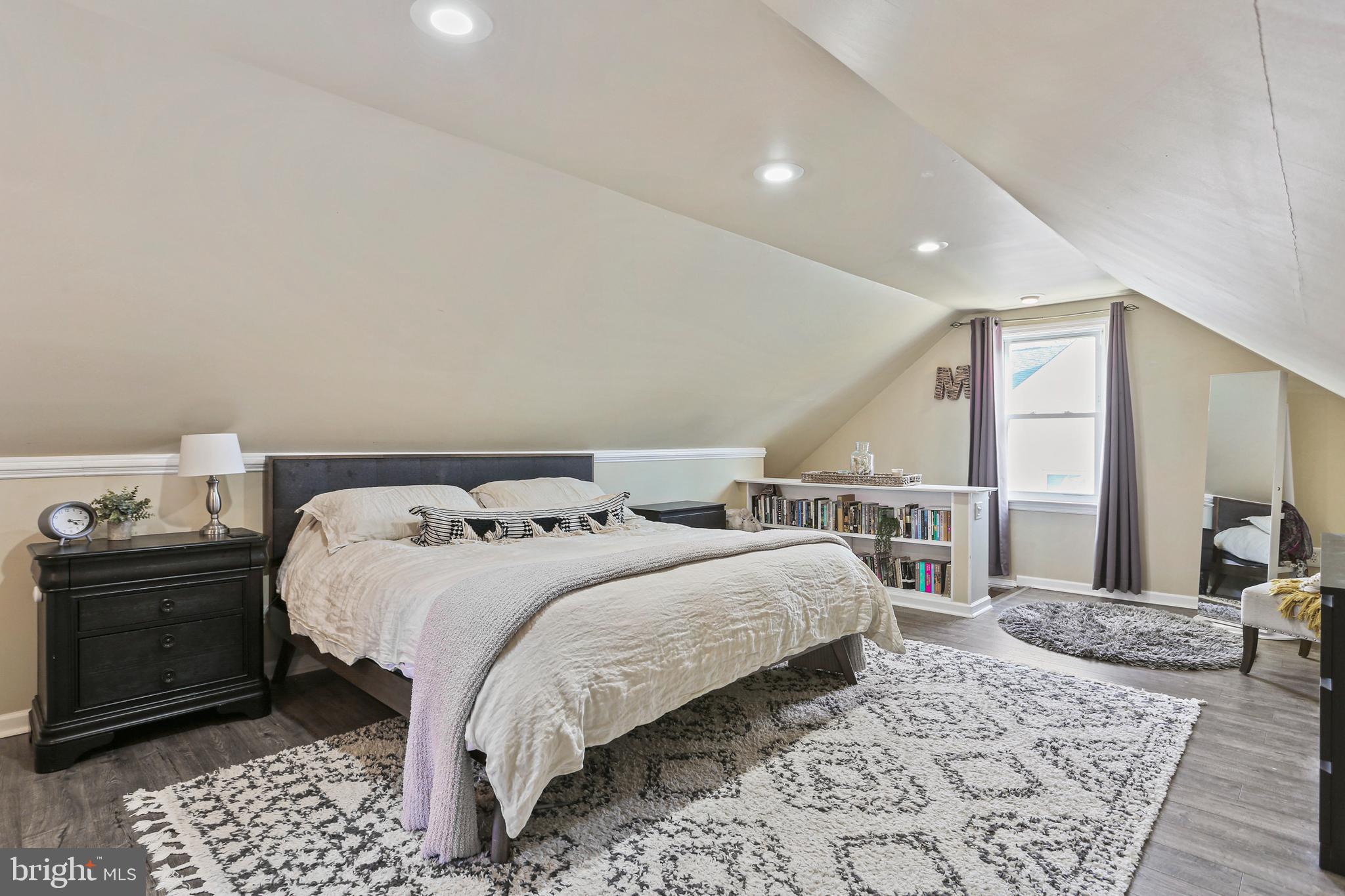 5509 Heatherwood Road Halethorpe, MD 21227 - Photo 3 of 34 Primary Bedroom w/New Luxury Vinyl Plank Flooring
