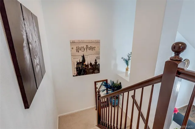 a view of entryway with stairs and wooden floor