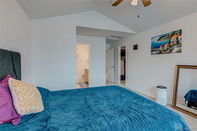 a view of an empty room and wooden floor