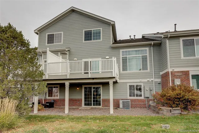 a view of a yard with seating space