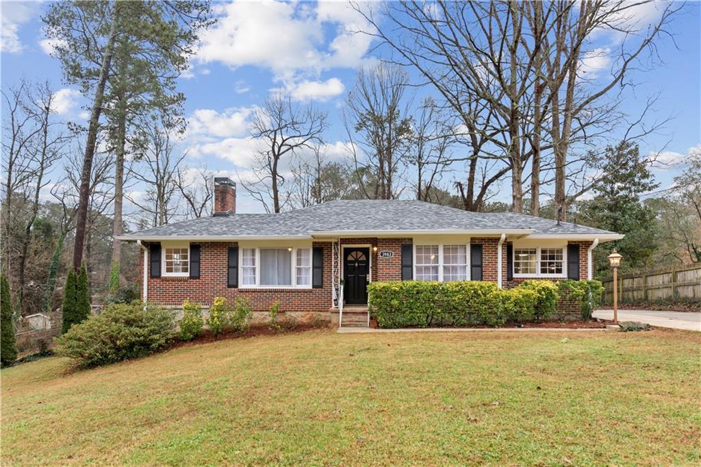3983 Norman Road Stone Mountain, GA 30083 - Photo 1 of 1 Lovely Brickfront Bungalow with freshly painted shutters, doors and trim. 3 Year old Roof!