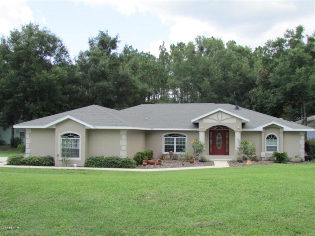 19845 Southwest 93rd Lane Road Dunnellon, FL 34432 - Photo 1 of 1 3BR/2BA w/ 2-Car Side-Entry Garage