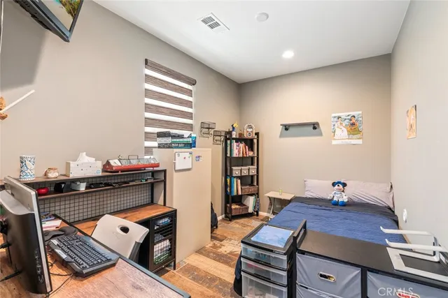 a workspace with furniture and window