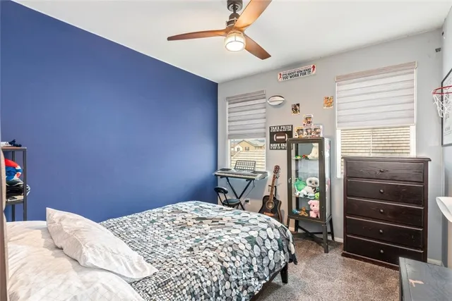 a bedroom with a bed and a closet