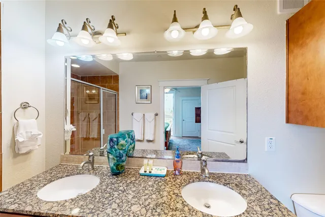 $690,000 | 26540 Mangrove Drive, Unit 203, Galveston, TX 77554