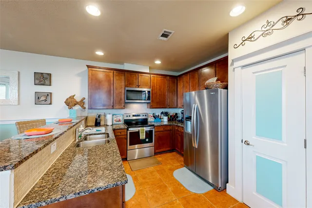 $690,000 | 26540 Mangrove Drive, Unit 203, Galveston, TX 77554