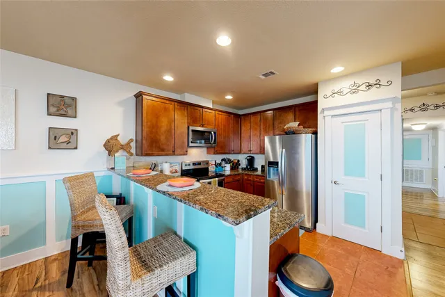 $690,000 | 26540 Mangrove Drive, Unit 203, Galveston, TX 77554