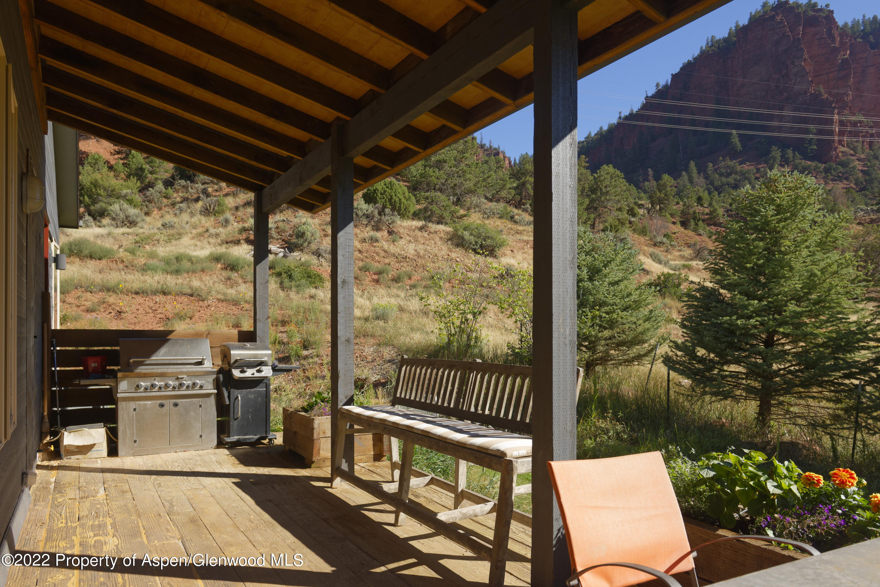 202 Castle View Drive Basalt, CO 81621 - Photo 20 of 29 a view of a porch with furniture and garden