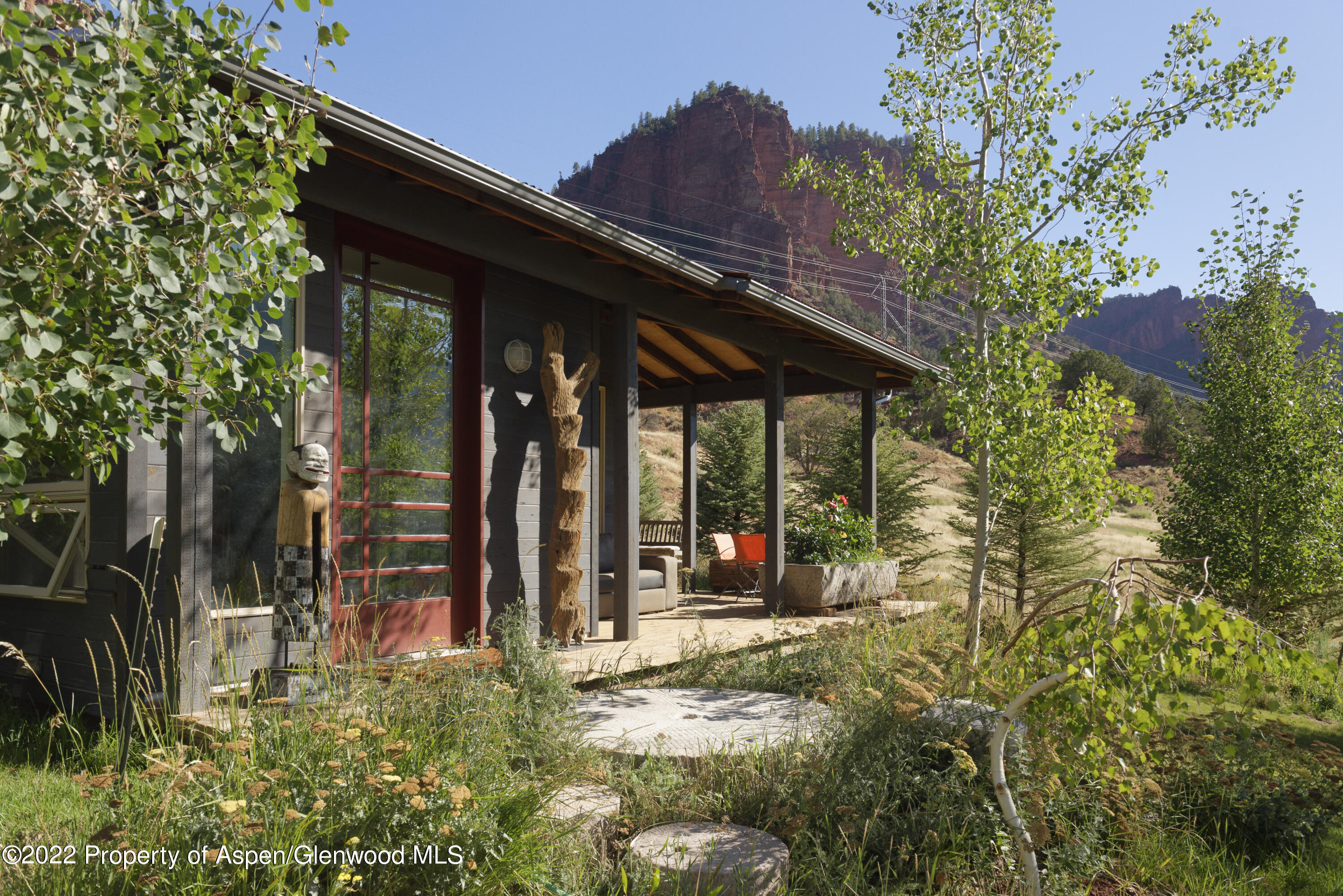 202 Castle View Drive Basalt, CO 81621 - Photo 23 of 29 front view of a house with a large tree