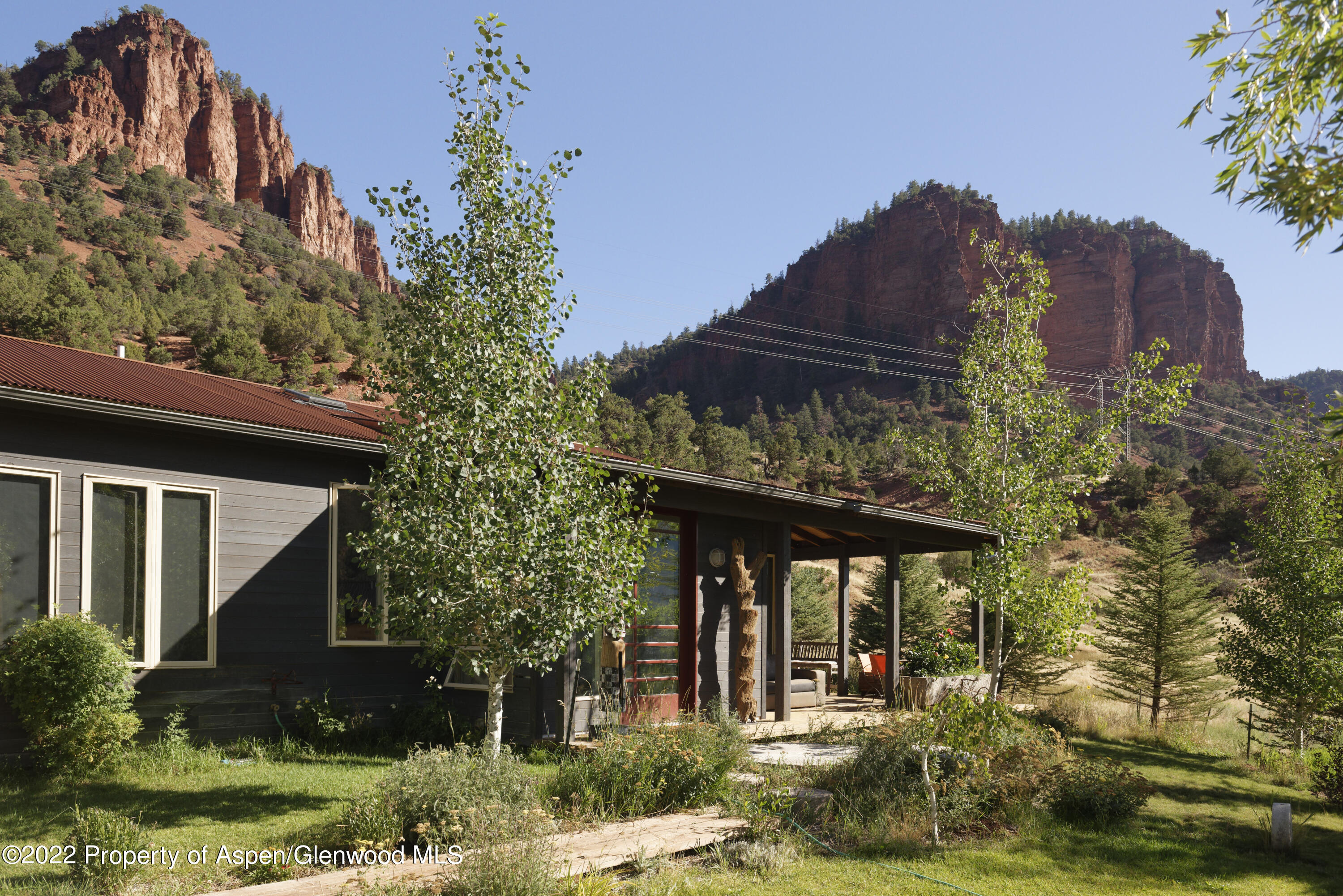 202 Castle View Drive Basalt, CO 81621 - Photo 3 of 29 a front view of a house with a yard