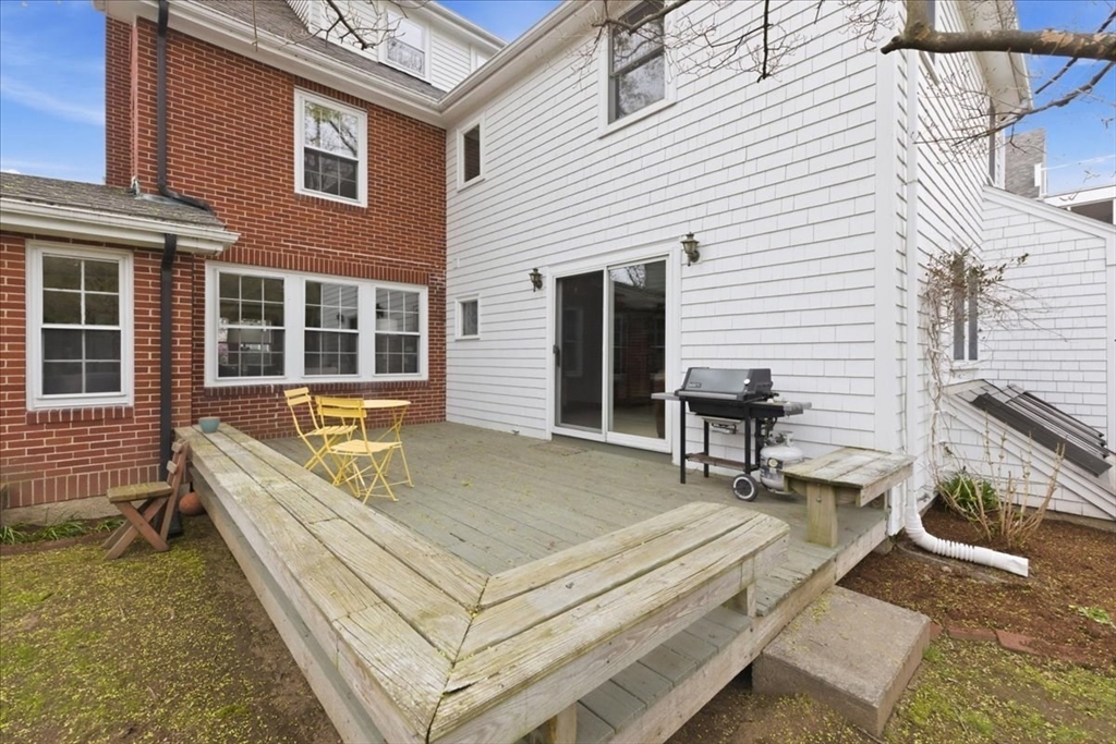 238 Harris Avenue Needham, MA 02492 - Photo 29 of 35 a view of a patio with table and chairs