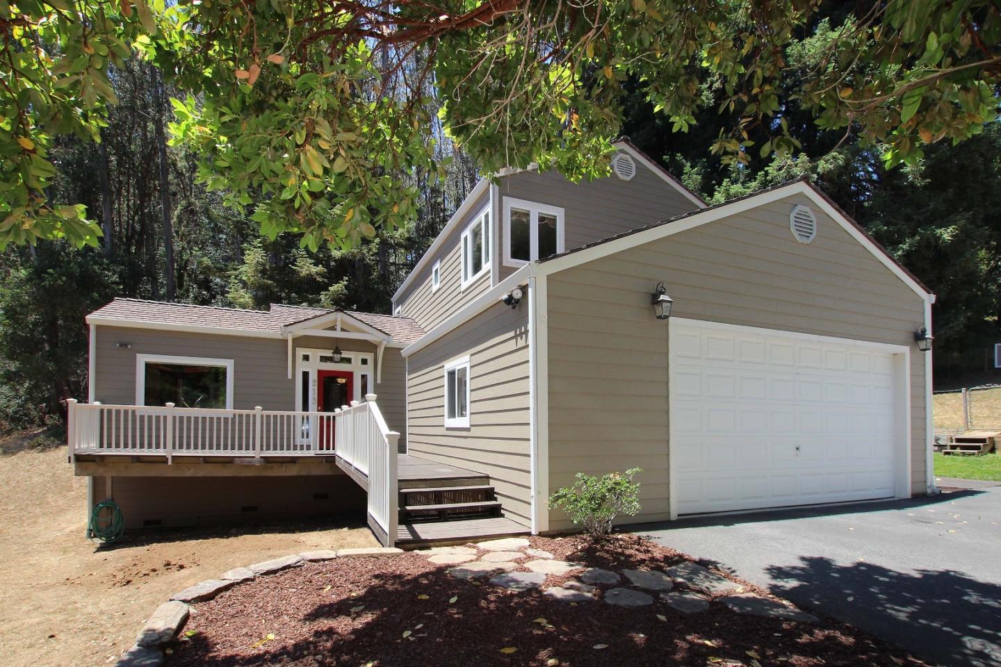 213 Gillette Road Watsonville, CA 95076 - Photo 1 of 27 a front view of a house with a yard