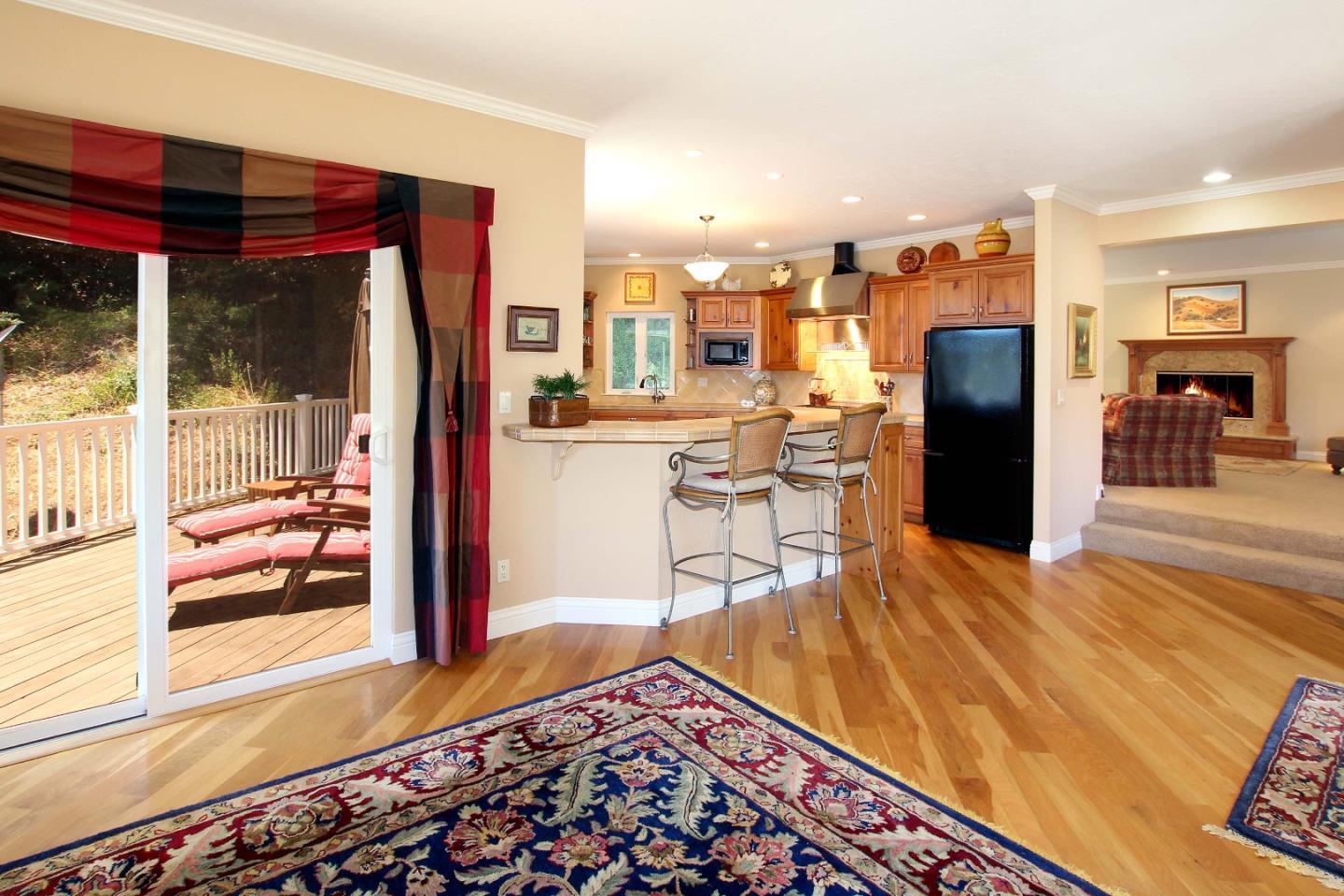 213 Gillette Road Watsonville, CA 95076 - Photo 21 of 27 a living room with furniture and a rug
