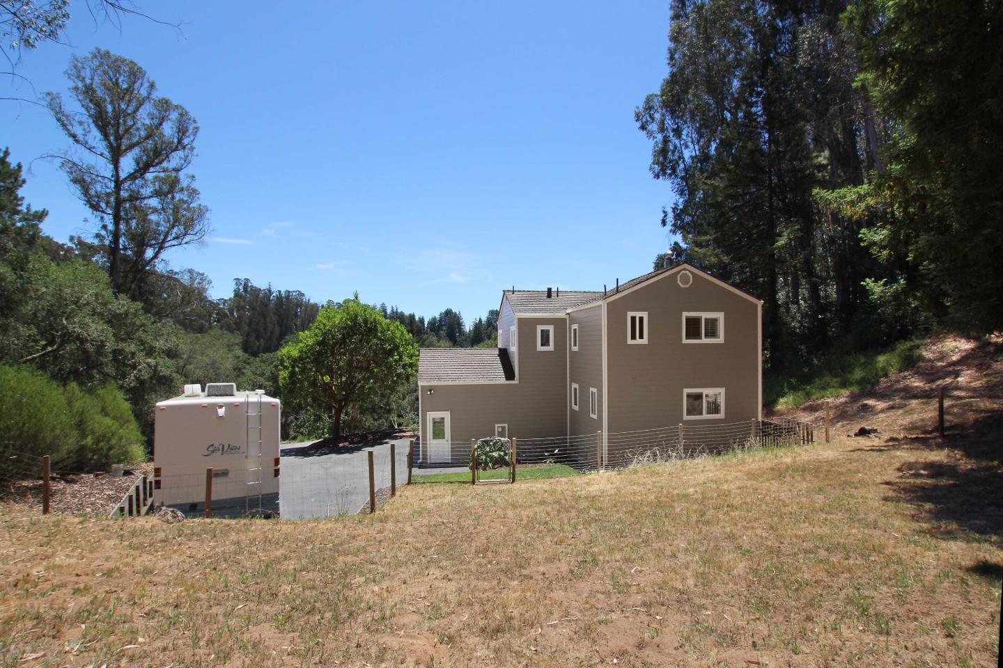 213 Gillette Road Watsonville, CA 95076 - Photo 3 of 27 a front view of a house with a yard