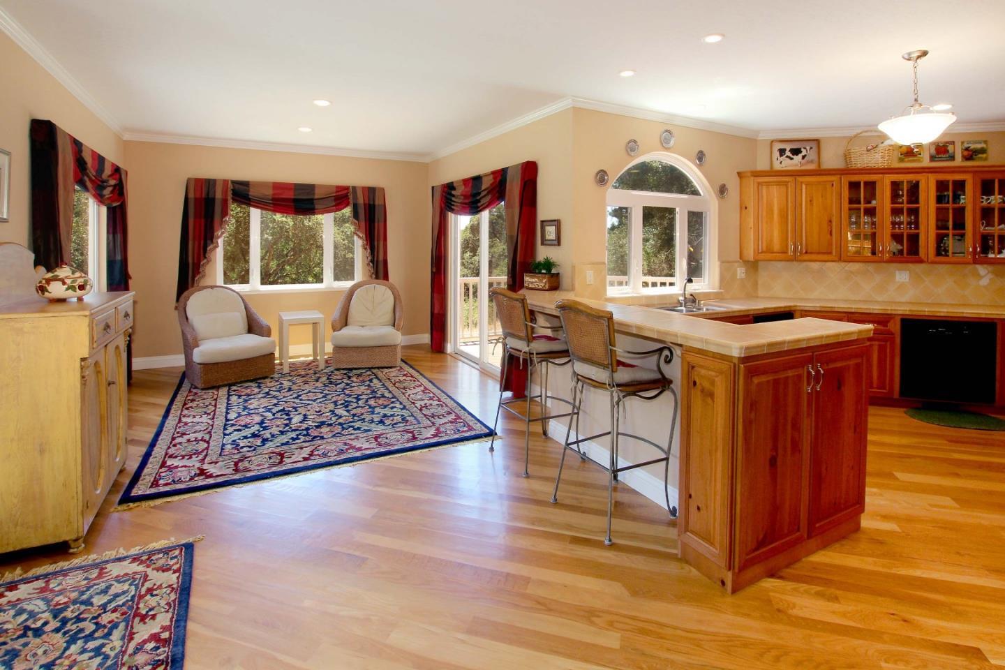 213 Gillette Road Watsonville, CA 95076 - Photo 4 of 27 a very nice looking living room with a large window and kitchen view