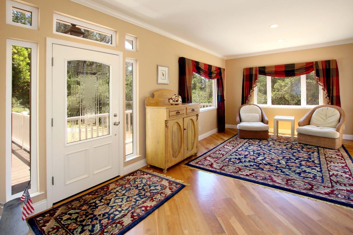 213 Gillette Road Watsonville, CA 95076 - Photo 6 of 27 a living room with furniture and a rug