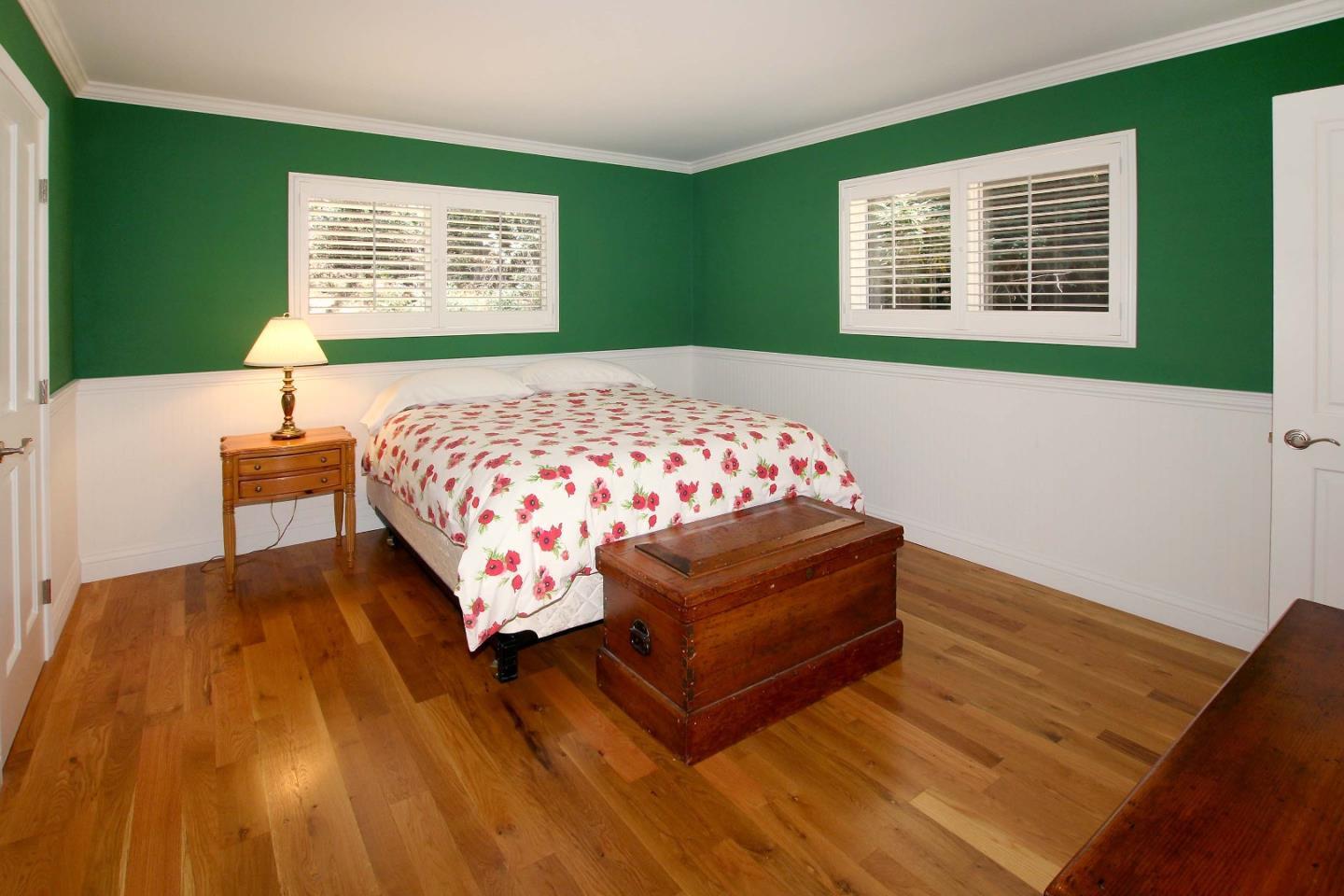 213 Gillette Road Watsonville, CA 95076 - Photo 8 of 27 a bedroom with a bed and a window