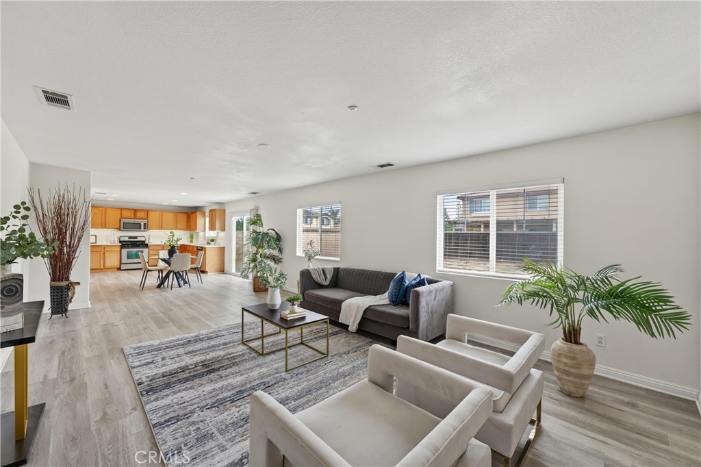 9406 Kentfield Court Riverside, CA 92508 - Photo 14 of 64 Perfect flow from the family room to the kitchen