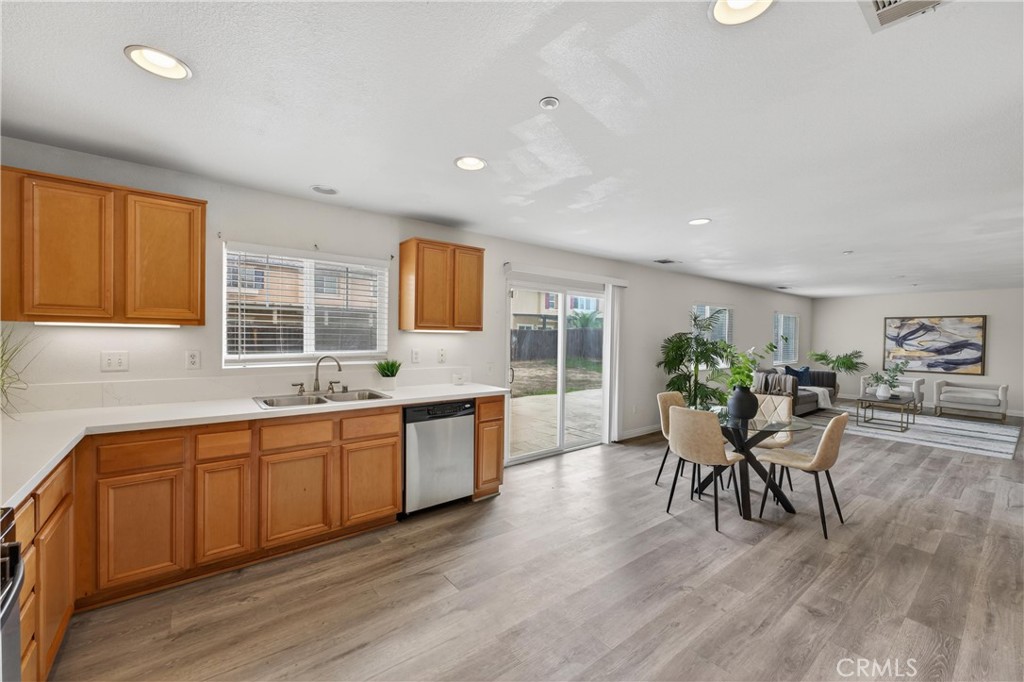 9406 Kentfield Court Riverside, CA 92508 - Photo 22 of 64 Open layout connects kitchen, dining, and family spaces
