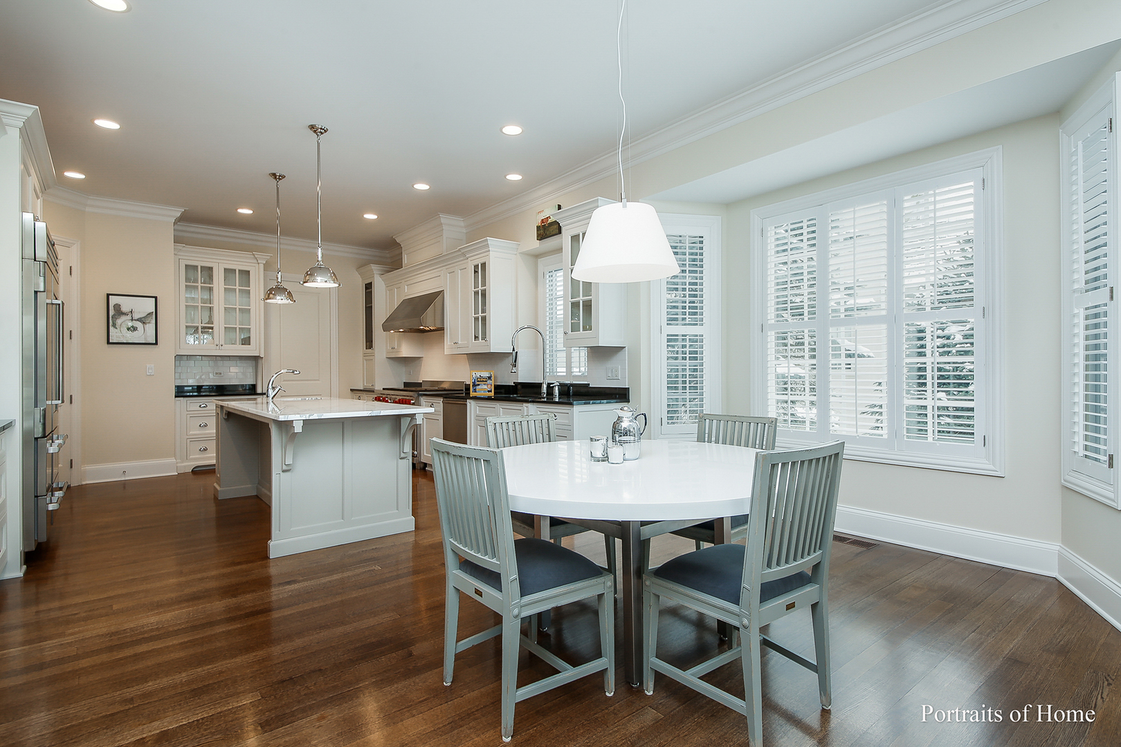 65 Forest Gate Circle Oak Brook, IL 60523 - Photo 6 of 14 a view of a dining room with furniture and wooden floor