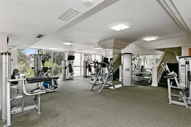 a view of a yard with palm trees