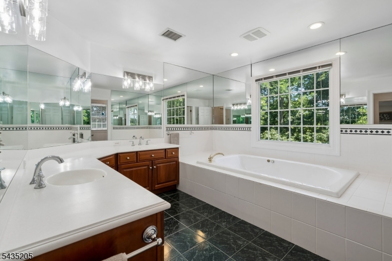 12 Oak Hill Road Bernards, NJ 07920 - Photo 14 of 33 a large kitchen with a sink and a large window
