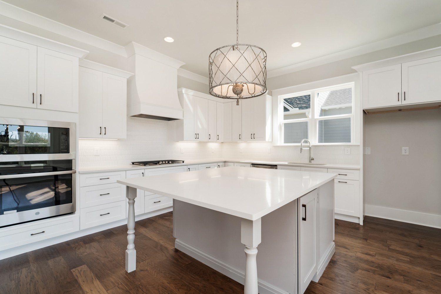 997 Spruce Ridge Lane Spring Hill, TN 37174 - Photo 13 of 30 a kitchen with a sink a window and stainless steel appliances