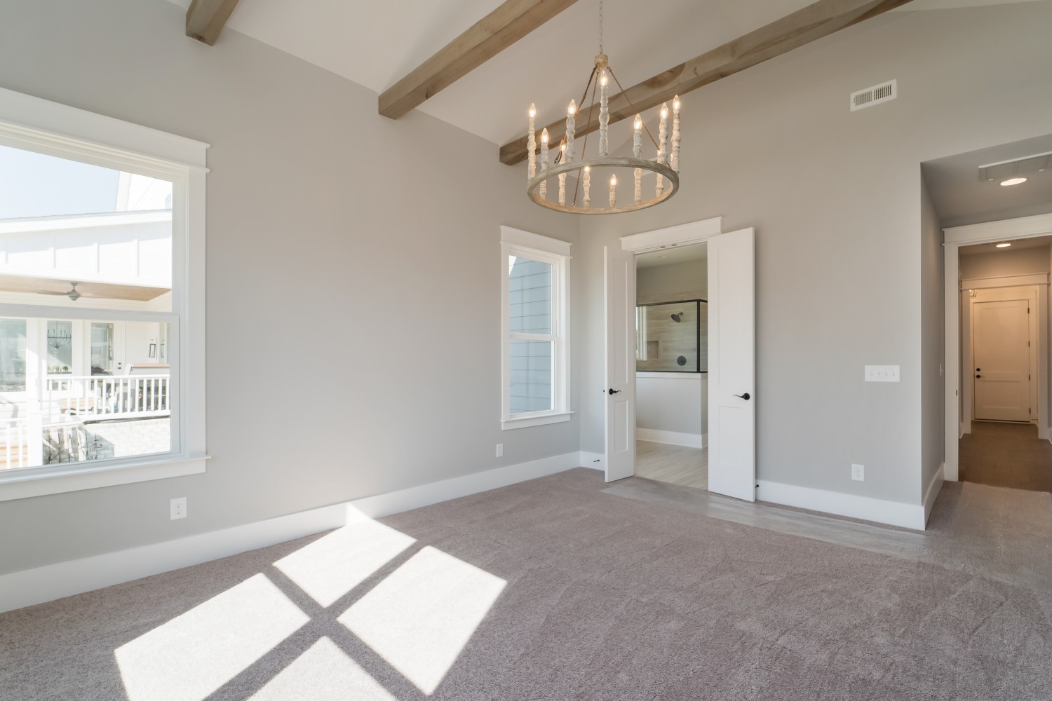 997 Spruce Ridge Lane Spring Hill, TN 37174 - Photo 18 of 30 a view of a livingroom with a chandelier fan and windows