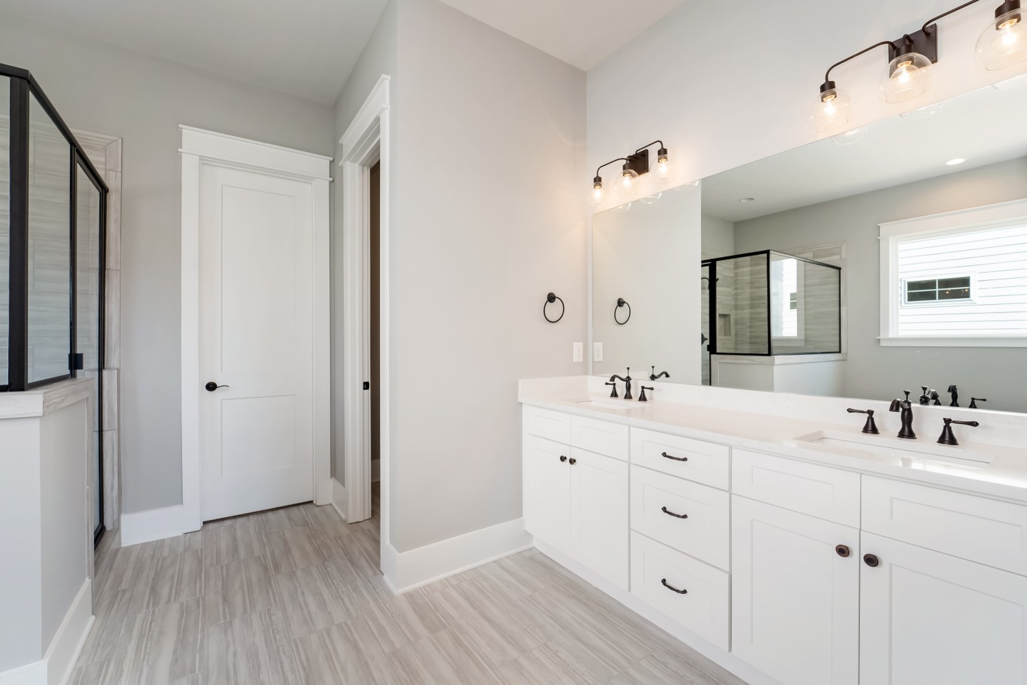 997 Spruce Ridge Lane Spring Hill, TN 37174 - Photo 20 of 30 a bathroom with a double vanity sink and mirror