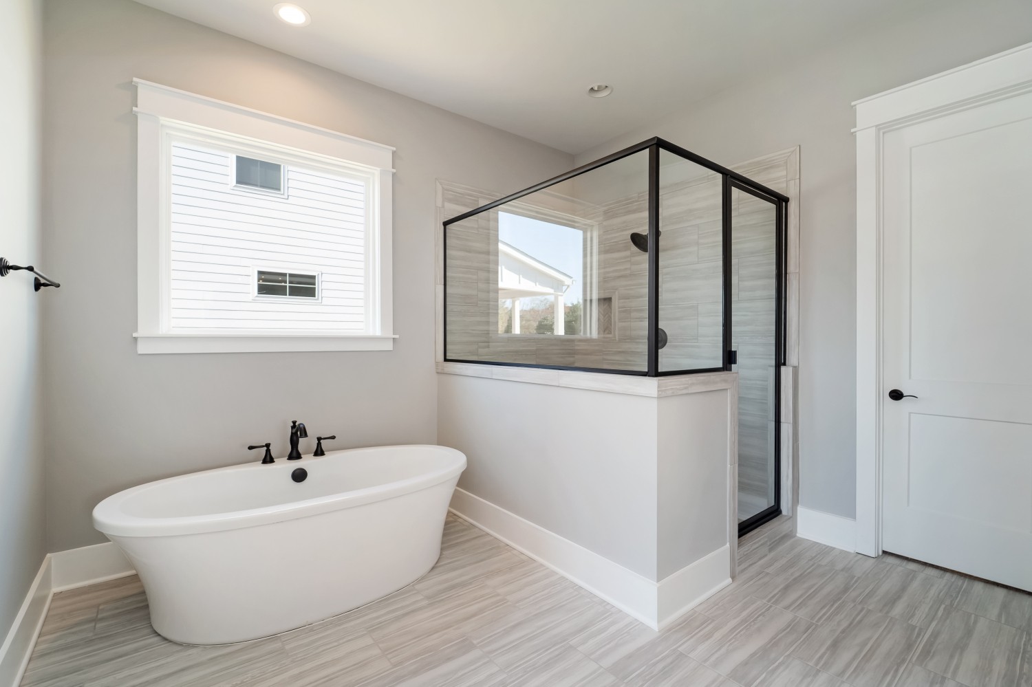 997 Spruce Ridge Lane Spring Hill, TN 37174 - Photo 21 of 30 a white bath tub sitting next to a white sink