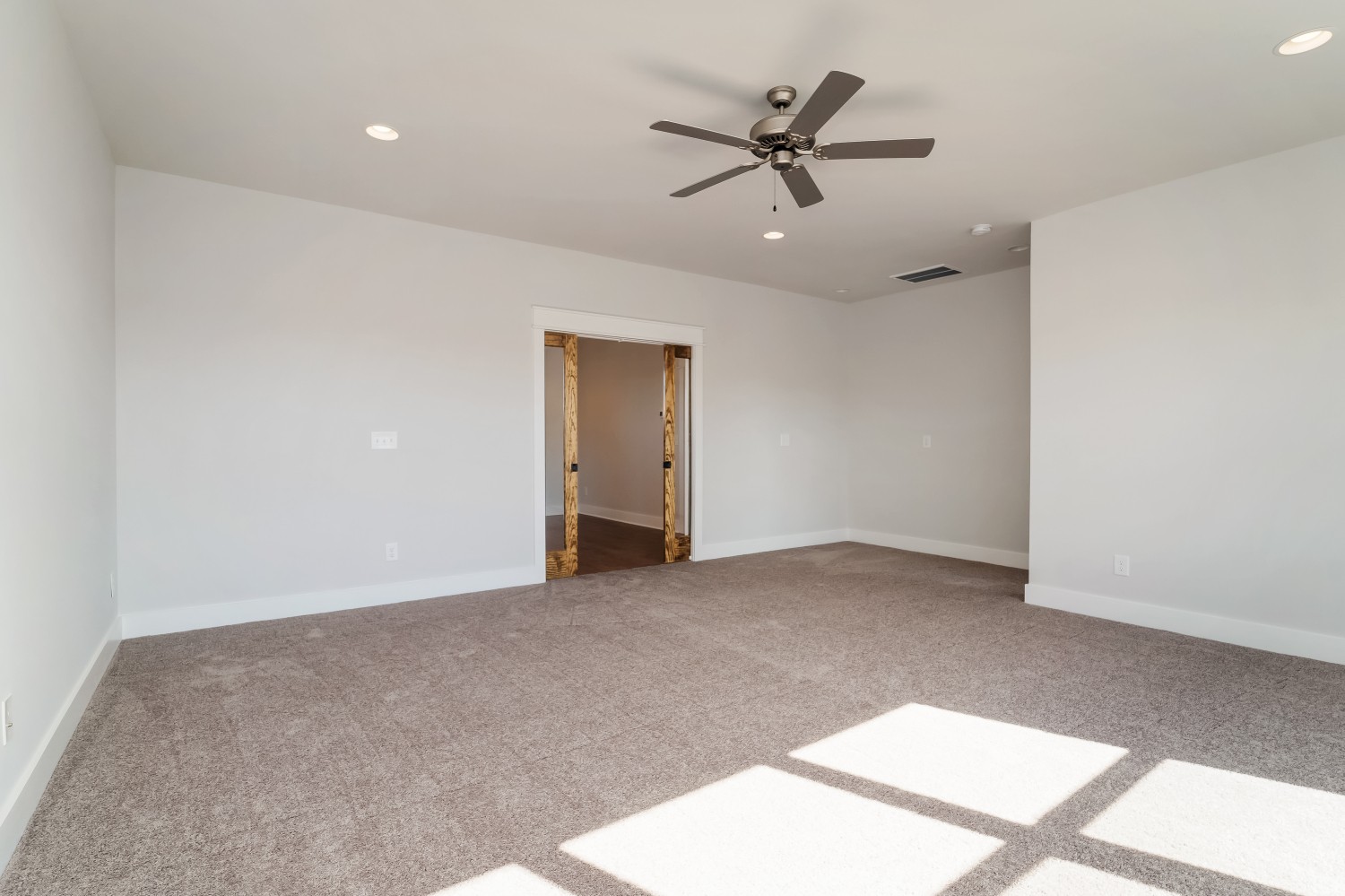 997 Spruce Ridge Lane Spring Hill, TN 37174 - Photo 25 of 30 an empty room with a ceiling fan and window