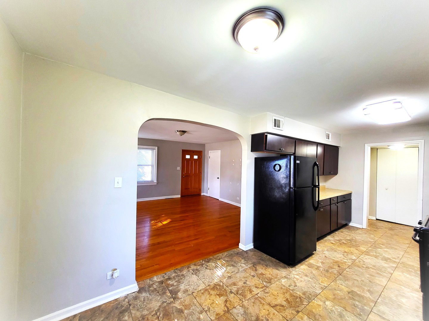 401 North Wolf Road Northlake, IL 60164 - Photo 4 of 15 a view of a kitchen with a refrigerator