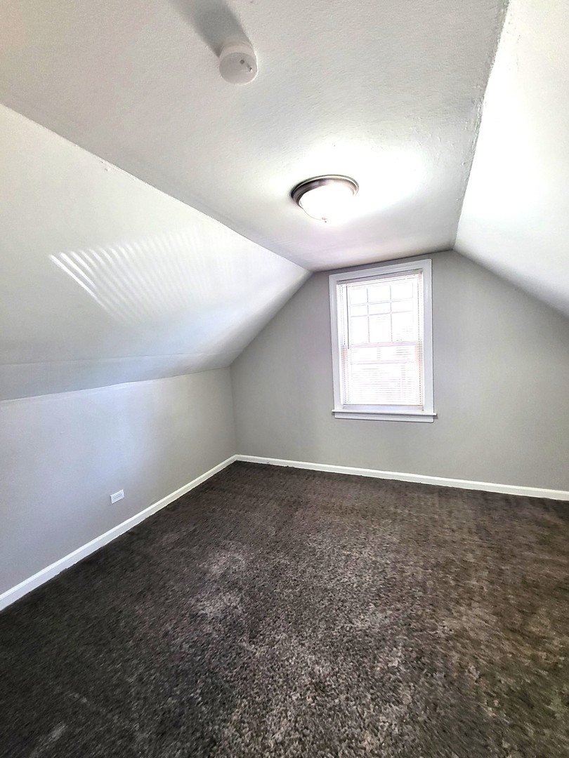 401 North Wolf Road Northlake, IL 60164 - Photo 8 of 15 an empty room with a empty space and windows