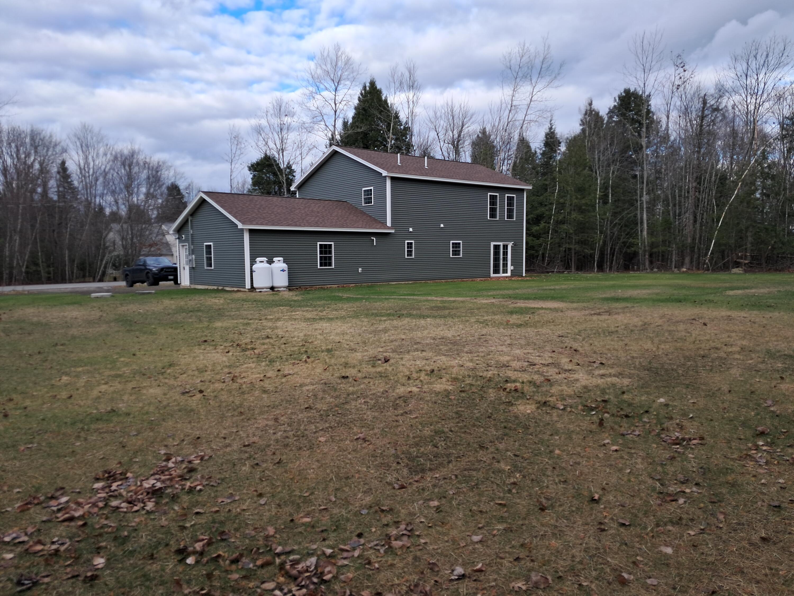 38 Vista Ridge Glenburn, ME 04401 - Photo 2 of 24 Back yard 1