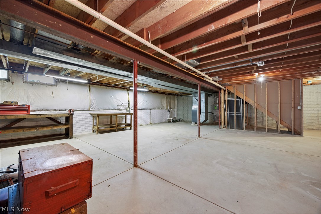 722 Jaycox Road Avon Lake, OH 44012 - Photo 40 of 48 Unfinished basement with concrete flooring and exposed ceiling joists