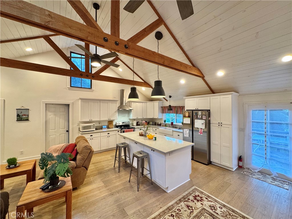 14941 Wildcat Canyon Road Silverado, CA 92676 - Photo 7 of 18 a kitchen with a table and chairs in it