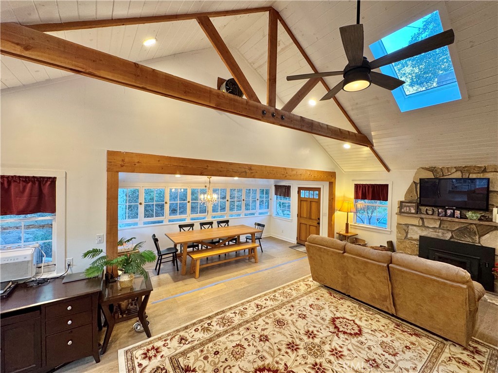 14941 Wildcat Canyon Road Silverado, CA 92676 - Photo 8 of 18 a living room with furniture and a flat screen tv