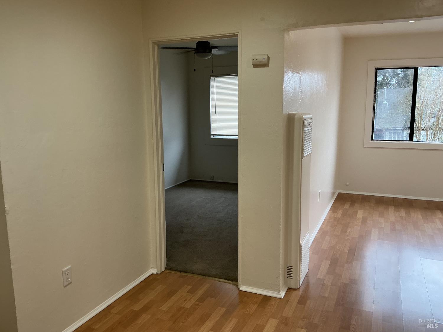 212 South E Street, Unit B Santa Rosa, CA 95404 - Photo 12 of 31 a view of hallway with wooden floor