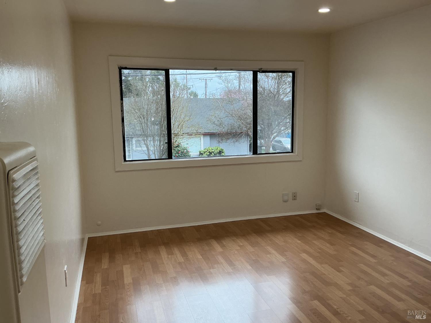 212 South E Street, Unit B Santa Rosa, CA 95404 - Photo 20 of 31 an empty room with a window