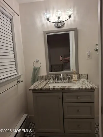 a vase with flowers sitting on a table