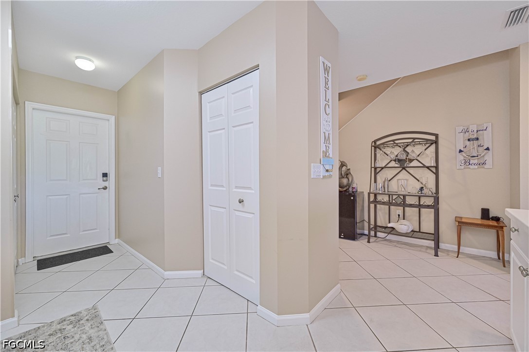 13120 Broadhurst Loop, Unit 505 Fort Myers, FL 33919 - Photo 15 of 28 a view of a livingroom with an entryway