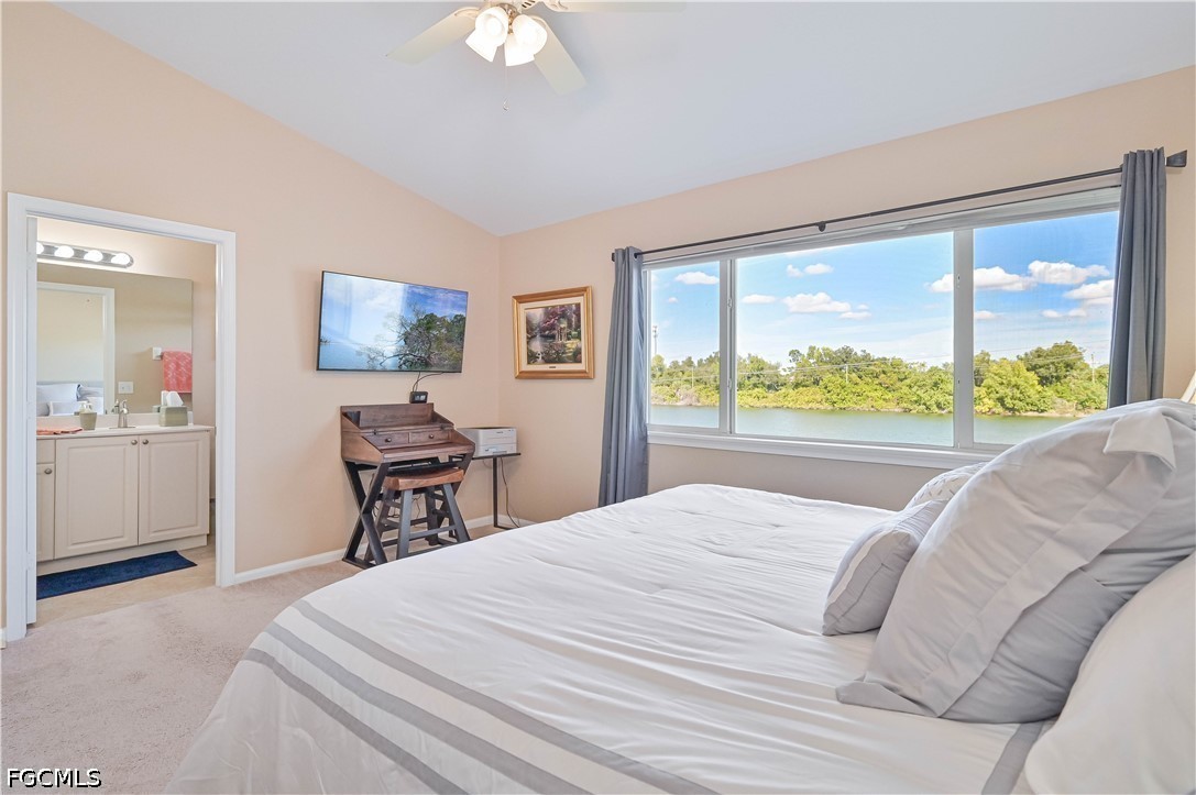 13120 Broadhurst Loop, Unit 505 Fort Myers, FL 33919 - Photo 19 of 28 a bedroom with a bed and a large window