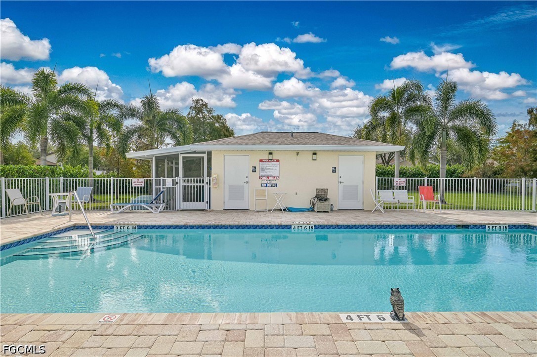 13120 Broadhurst Loop, Unit 505 Fort Myers, FL 33919 - Photo 28 of 28 a view of a house with a swimming pool